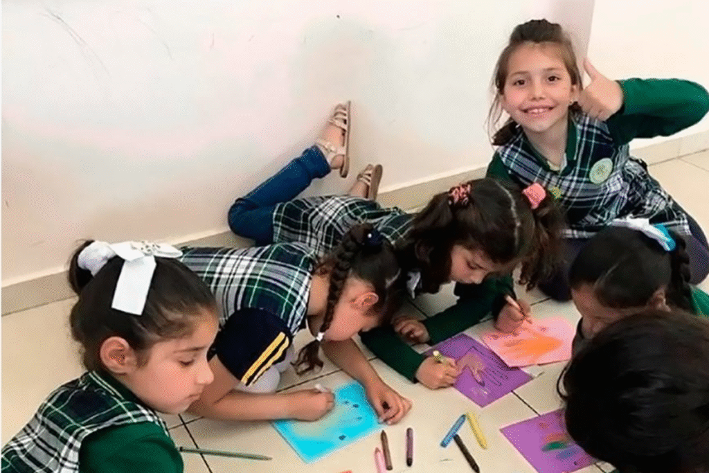 Children participating in Act2gether Palestine's well-being programme session